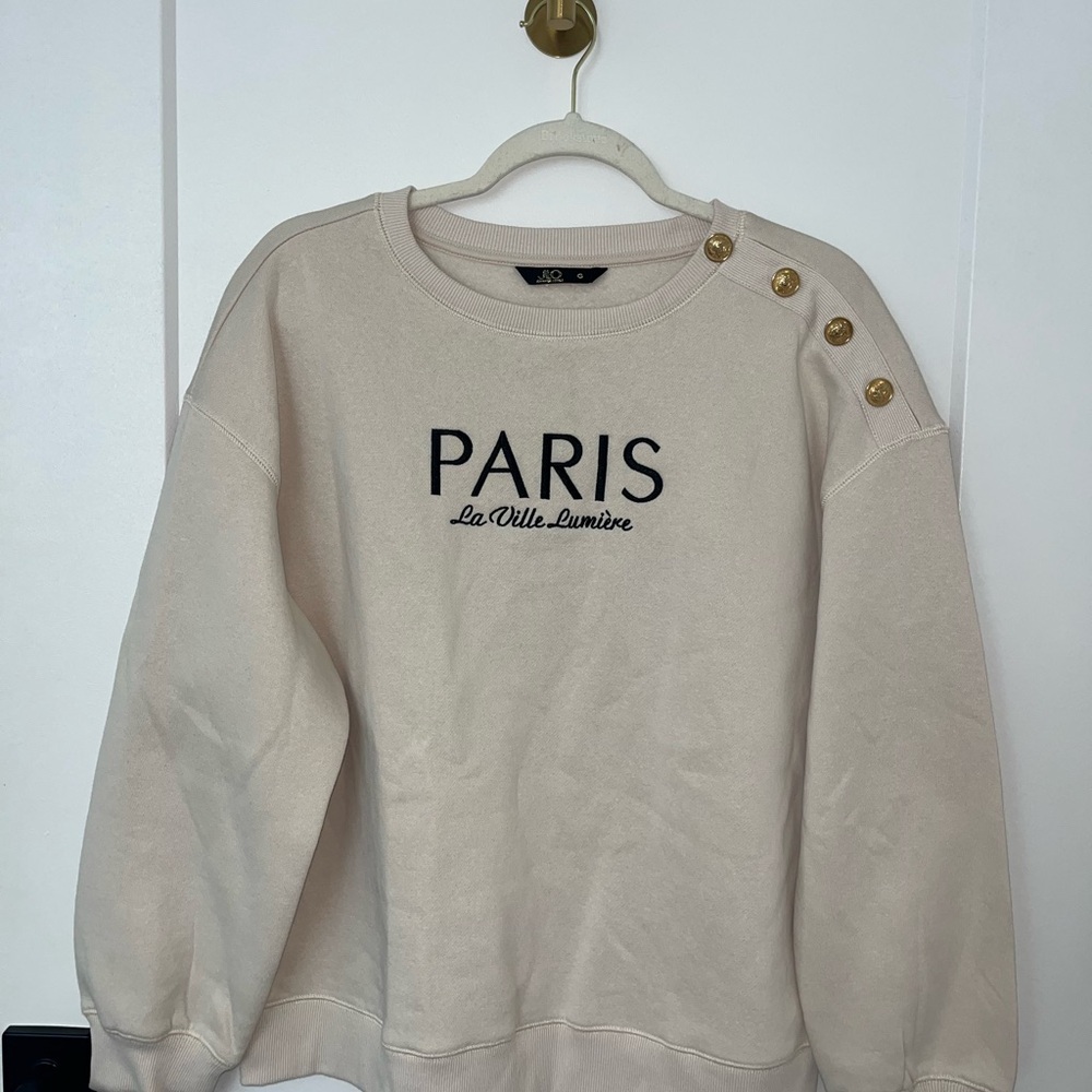 Jennifer Lopez Cream Crewneck Sweater with Black PARIS Embroidery